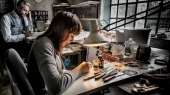 The workshop of decoration; a decorator with a brush